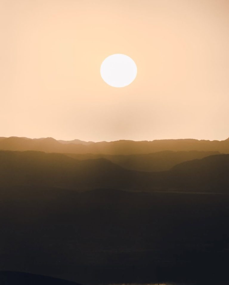 Sun setting over the Sahara desert near Merzouga – Merzouga
