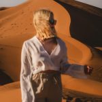 Woman exploring the sand dunes of Merzouga – Merzouga, Morocco