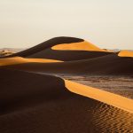 Sand dunes glowing in the evening light in Merzouga – Merzouga, Morocco
