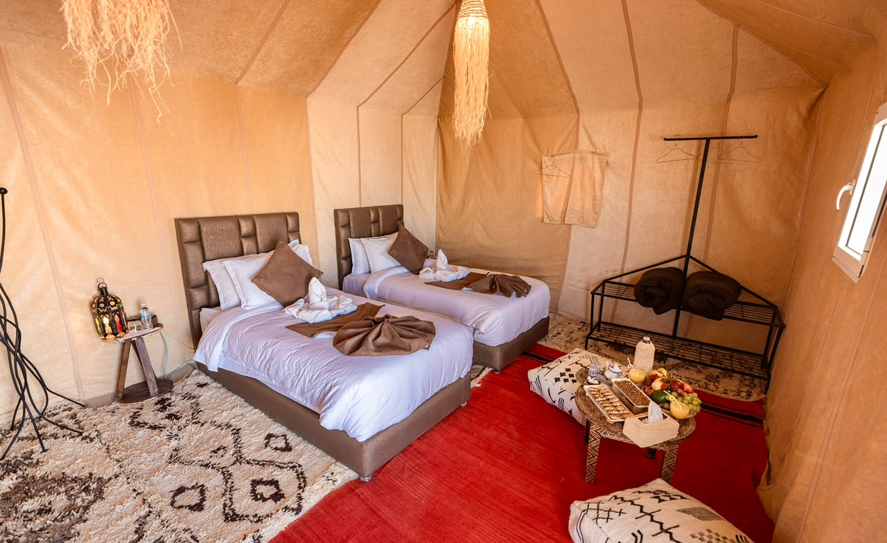 Luxury suite tent with king bed and Berber rugs