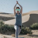 Yoga practice in front of the Merzouga dunes – Merzouga, Morocco