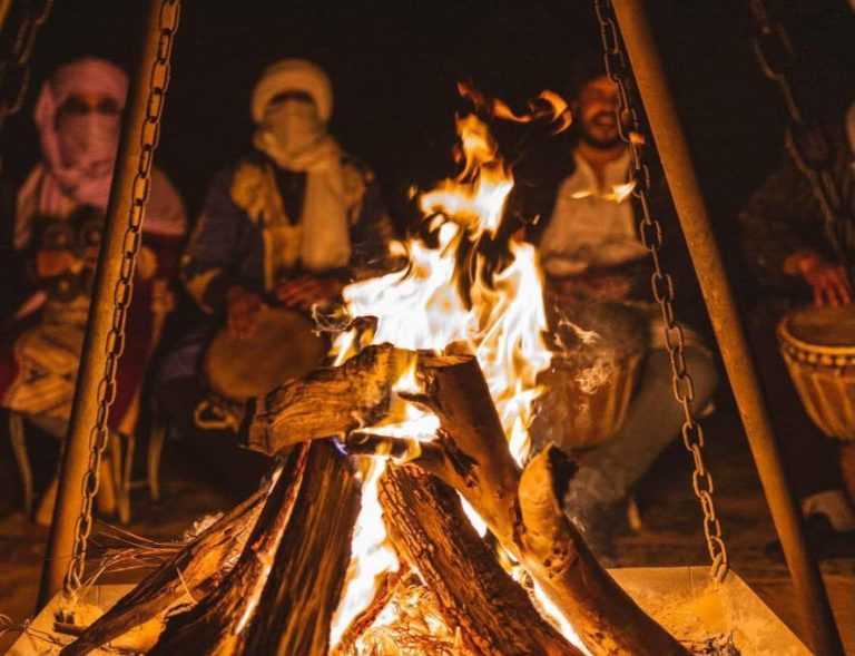 Berber musicians playing drums by the campfire – Merzouga