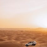 4x4 vehicle in the Merzouga dunes at sunset – Merzouga, Morocco