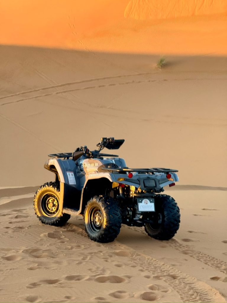 ATV Quad Bike ATV quad bike parked on the dunes – Merzouga