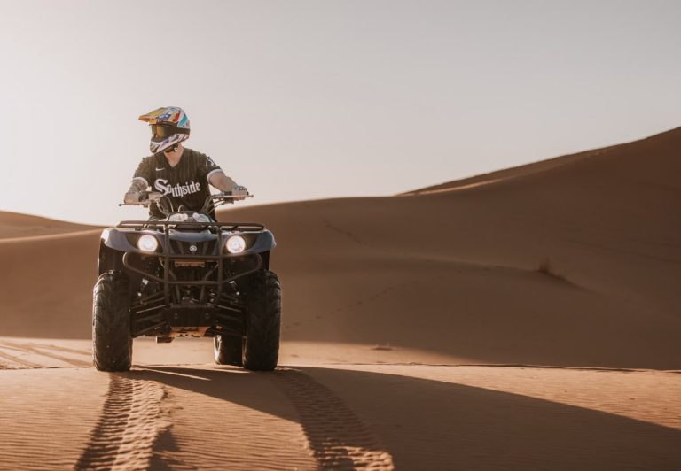 ATV Quad Bike Rider on an ATV quad bike in the dunes – Merzouga