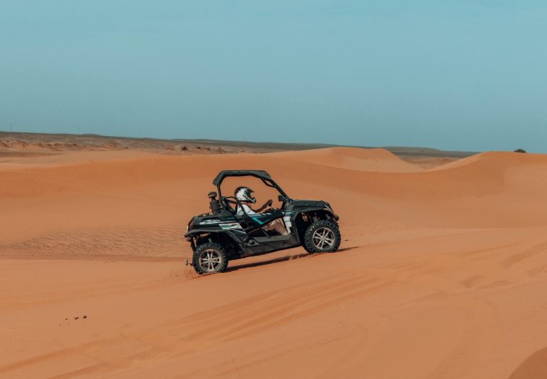 Buggy driving on the sand dunes – Merzouga