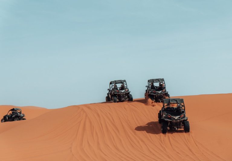 Three buggies on top of a dune in Erg Chebbi – Merzouga
