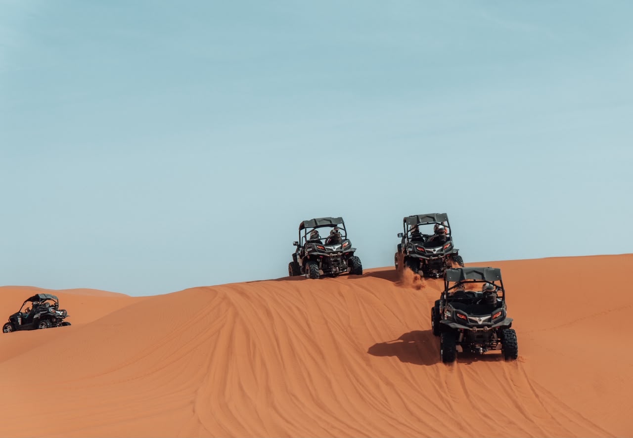 4x4 Desert Excursion Three buggies on top of a dune in Erg Chebbi – Merzouga