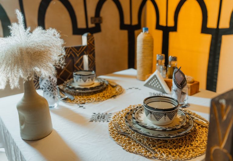 Moroccan table setting with tea glasses in a camp restaurant – Merzouga
