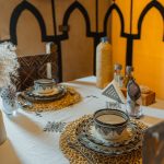 Moroccan dinner plates and tagine setting – Merzouga, Morocco